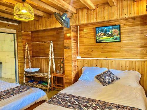 Postel nebo postele na pokoji v ubytování Màn Di Homestay Lô Lô Chải