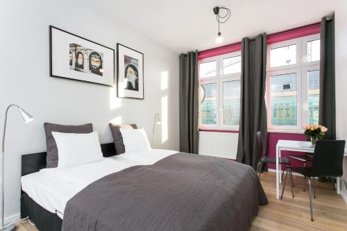 Кровать или кровати в номере Krakow B&B