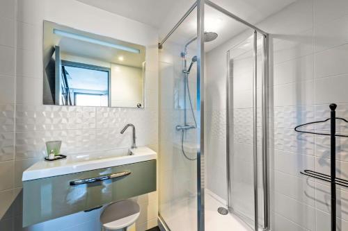 Koupelna v ubytování Studio vue mer 15m de la plage