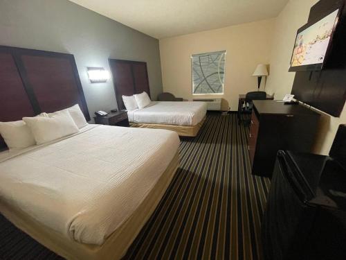 Un ou plusieurs lits dans un hébergement de l'établissement The Rutledge Inn