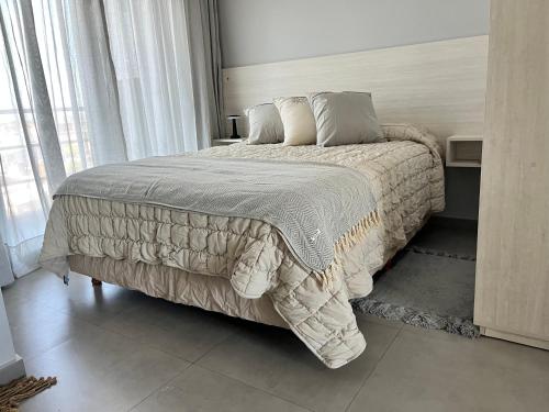 Postel nebo postele na pokoji v ubytování Departamento Chivilcoy