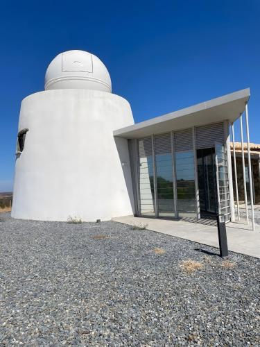 a building with a observatory in front of it at Moinhos da Pateira - Moleiro in Alcoutim