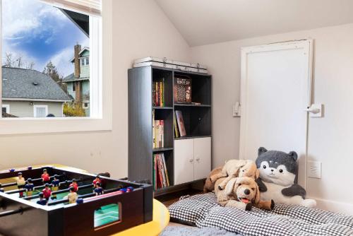 a childs room with a lego table and toys at Sunny 3BR Home Near UW & Children Hospital Gym in Seattle