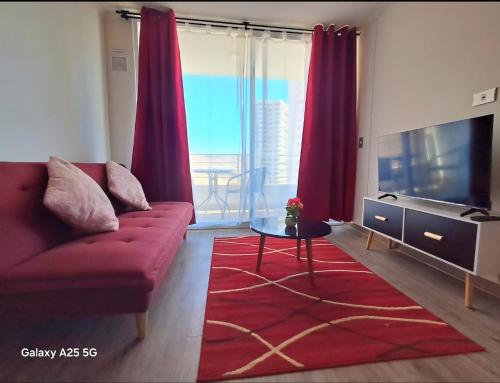 TV a/nebo společenská místnost v ubytování Hermosa vista al mar II dpto Sector Sur Llacolen