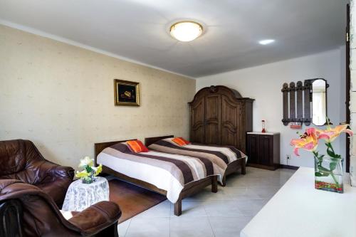 Ένα ή περισσότερα κρεβάτια σε δωμάτιο στο Apartamenty Magia