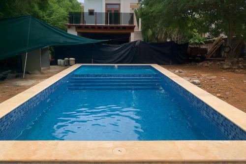 Πισίνα στο ή κοντά στο Casa Maria Bonita