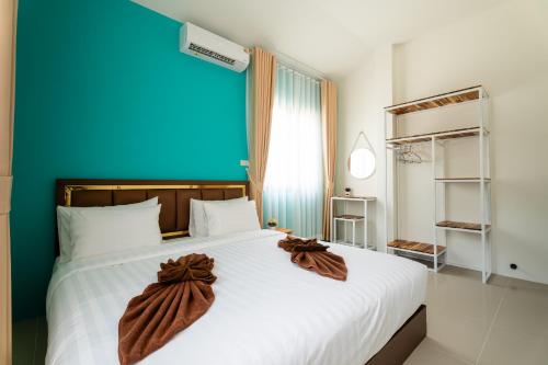 Ένα ή περισσότερα κρεβάτια σε δωμάτιο στο Wow Mountain Pool Villa Aonang