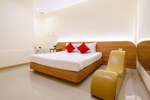 Postel nebo postele na pokoji v ubytování OK Resort Banchang