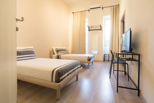 Kamar di Romano Rooms