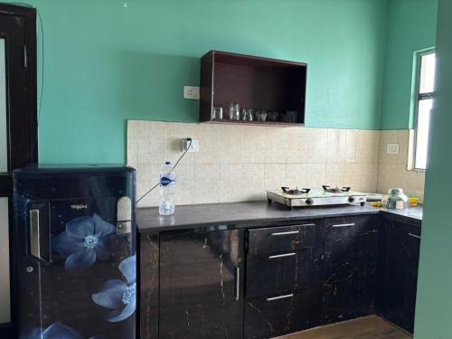 Kuchyň nebo kuchyňský kout v ubytování By the Ganges