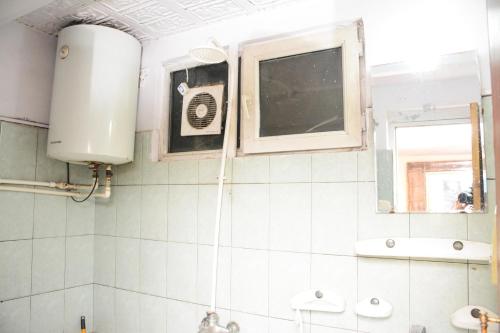 a bathroom with a sink and a window at Kabul Blue Star Guest House Number 2 in Kabul