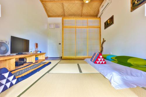โทรทัศน์และ/หรือระบบความบันเทิงของ Om Yoga Resort