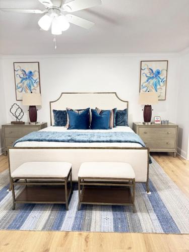 Ένα ή περισσότερα κρεβάτια σε δωμάτιο στο Blue Bay Cottage