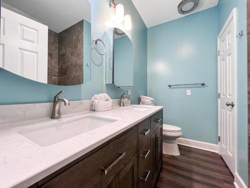 a bathroom with a large sink and a toilet at Canterbury Court - 6A in Myrtle Beach
