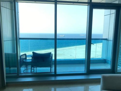2BR Beachfront Apartment with Ocean Views