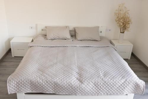 Ένα ή περισσότερα κρεβάτια σε δωμάτιο στο Маєток Боромицький