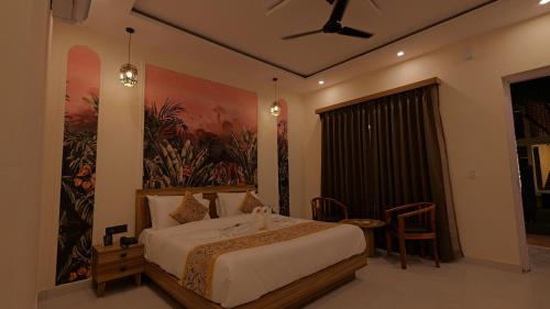 Postel nebo postele na pokoji v ubytování kpj corbett manor