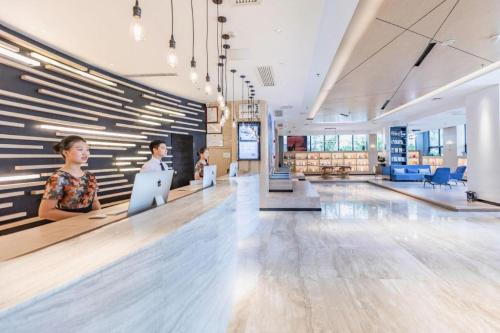 Photo de la galerie de l'établissement Atour Hotel Xiamen City Government Dongdu Passenger Transport Terminal, à Xiamen