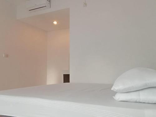 Postel nebo postele na pokoji v ubytování Sisilia Lodge