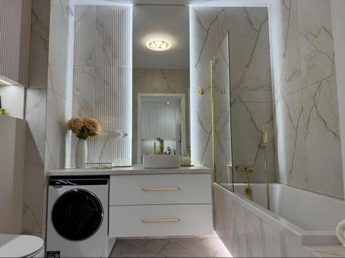 Et badeværelse på Apartament Villa Piano