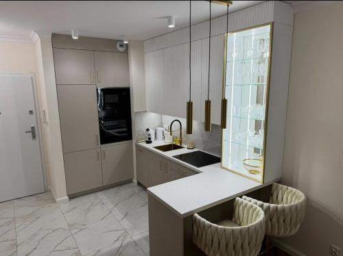 Køkken eller tekøkken på Apartament Villa Piano