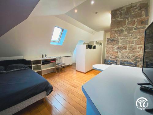 Ένα ή περισσότερα κρεβάτια σε δωμάτιο στο La Maison de Camille