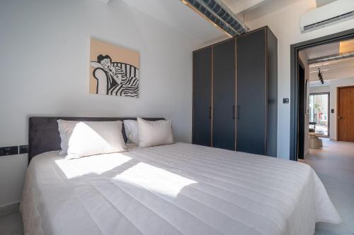 Ένα ή περισσότερα κρεβάτια σε δωμάτιο στο Centro-1 2 BED