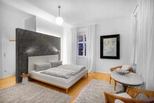 Ένα ή περισσότερα κρεβάτια σε δωμάτιο στο Fewo im Blauen Haus Eg