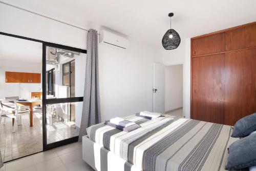 Postel nebo postele na pokoji v ubytování Summer Place 2