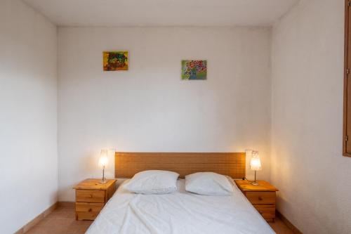 Postel nebo postele na pokoji v ubytování Les Sources Gite Cabernet