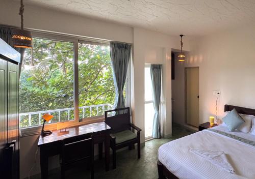 Ένα ή περισσότερα κρεβάτια σε δωμάτιο στο Bay Village Inn