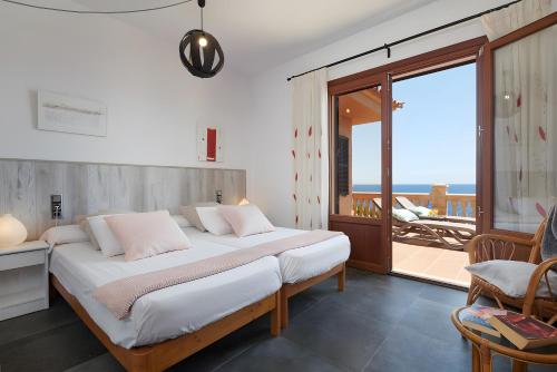 Ένα ή περισσότερα κρεβάτια σε δωμάτιο στο Ses Penyes