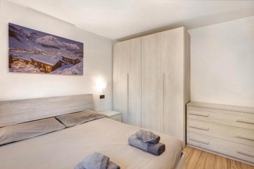 En eller flere senge i et værelse på Palipert Flowers House