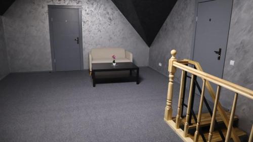 Łóżko lub łóżka w pokoju w obiekcie Miķeļi