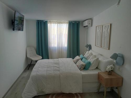 Giường trong phòng chung tại L'Etage