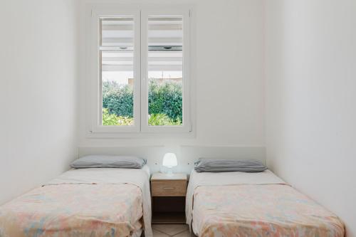 Postel nebo postele na pokoji v ubytování The Pearl Of Sicily New Salt Pool