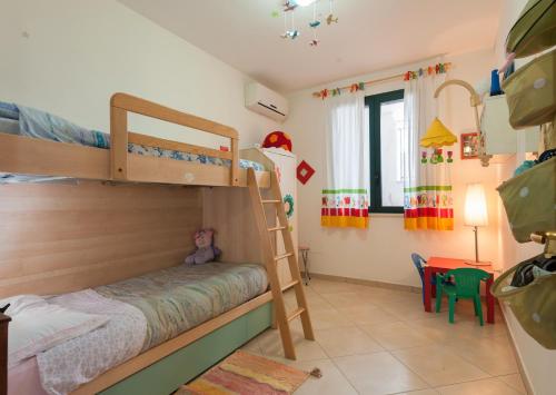 En eller flere senge i et værelse på Casa Dolce Vita