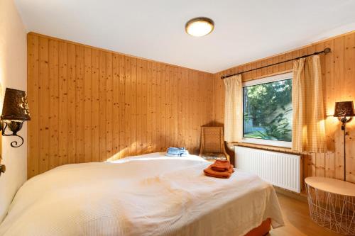 Una cama o camas en una habitación de Ferienhaus Familie Plaß