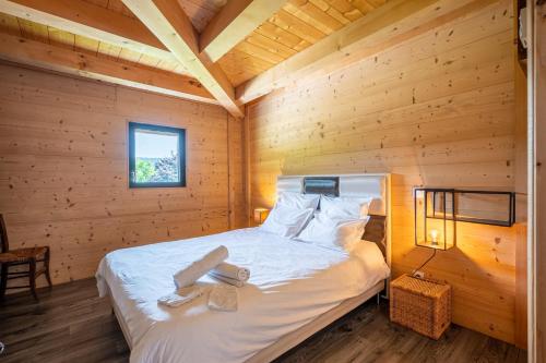 Postel nebo postele na pokoji v ubytování Gite La Quintessence