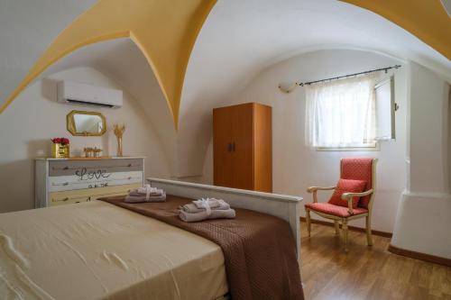 Ένα ή περισσότερα κρεβάτια σε δωμάτιο στο Casa Ta Nonna