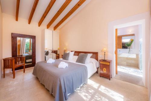 Giường trong phòng chung tại Sa Plana