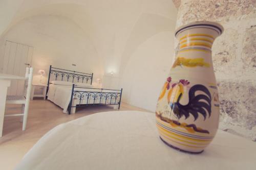 Postel nebo postele na pokoji v ubytování La Scalella - Fortificato x 2