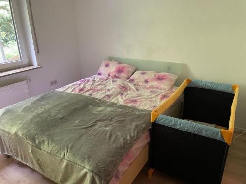 Un ou plusieurs lits dans un hébergement de l'établissement Ganze Wohnung In Ruhiger Lage