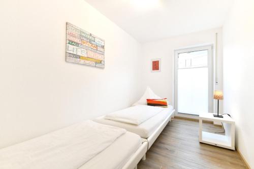 Postel nebo postele na pokoji v ubytování Dinkelbach Feriendomicil 2 B