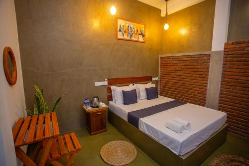 Ένα ή περισσότερα κρεβάτια σε δωμάτιο στο Kelly Ahangama