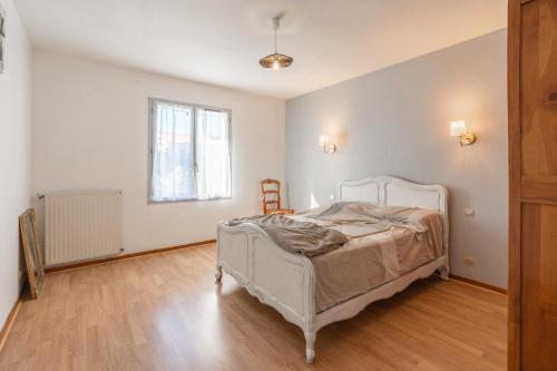 Postel nebo postele na pokoji v ubytování Maison de famille avec Jardin