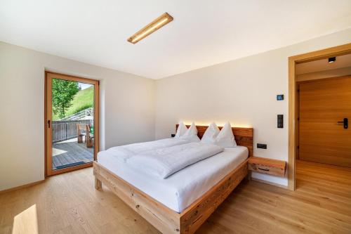 Postel nebo postele na pokoji v ubytování Bergchalet Prantach W75