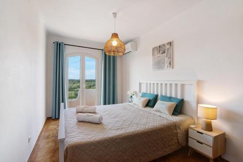 Postel nebo postele na pokoji v ubytování Altura Beach Villa