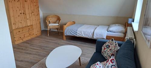 Postel nebo postele na pokoji v ubytování Fewo Sandbank