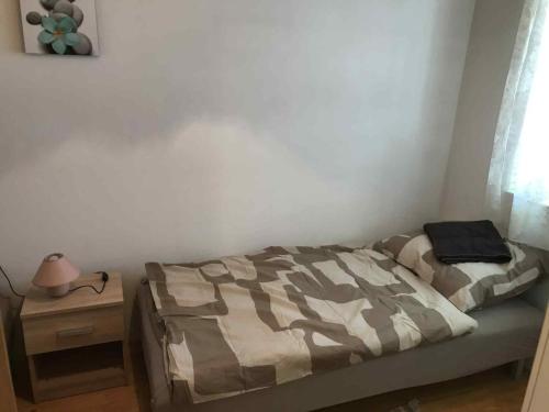 Postel nebo postele na pokoji v ubytování Tomi Vendégház